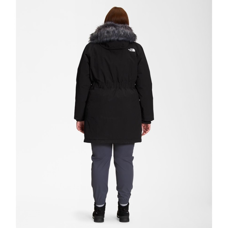 أسود الوجه الشمالي للمرأة بالإضافة إلى سترة القطب الشمالي