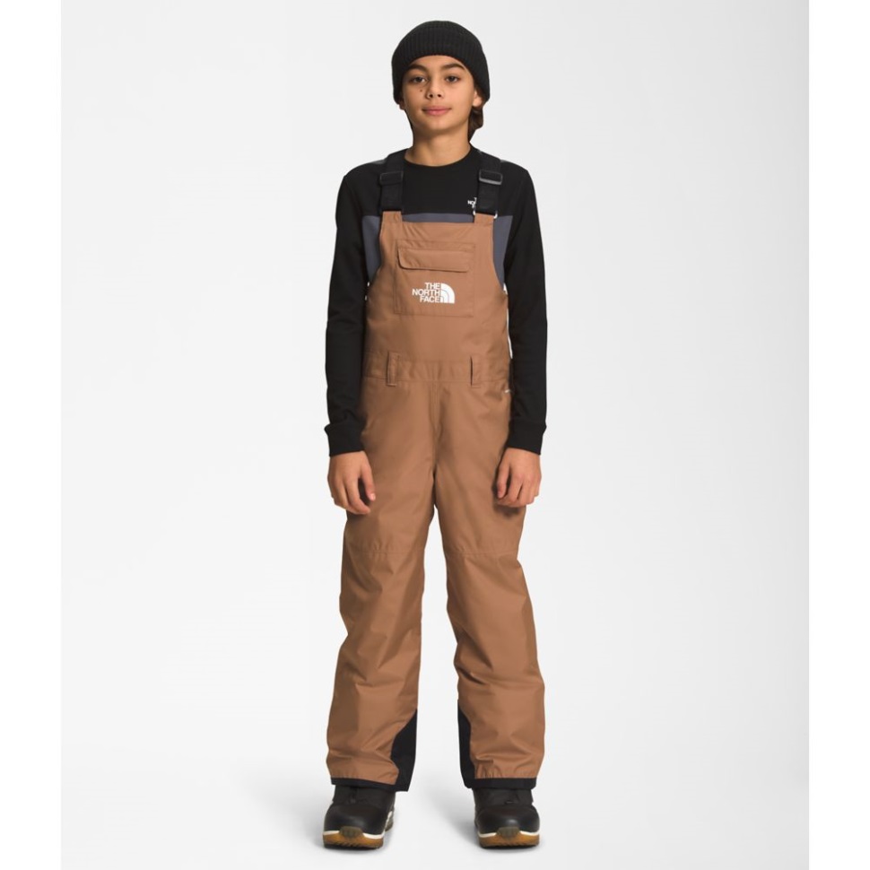 المرايل المعزولة بالوجه الشمالي للمراهقين والمحمصة باللون البني