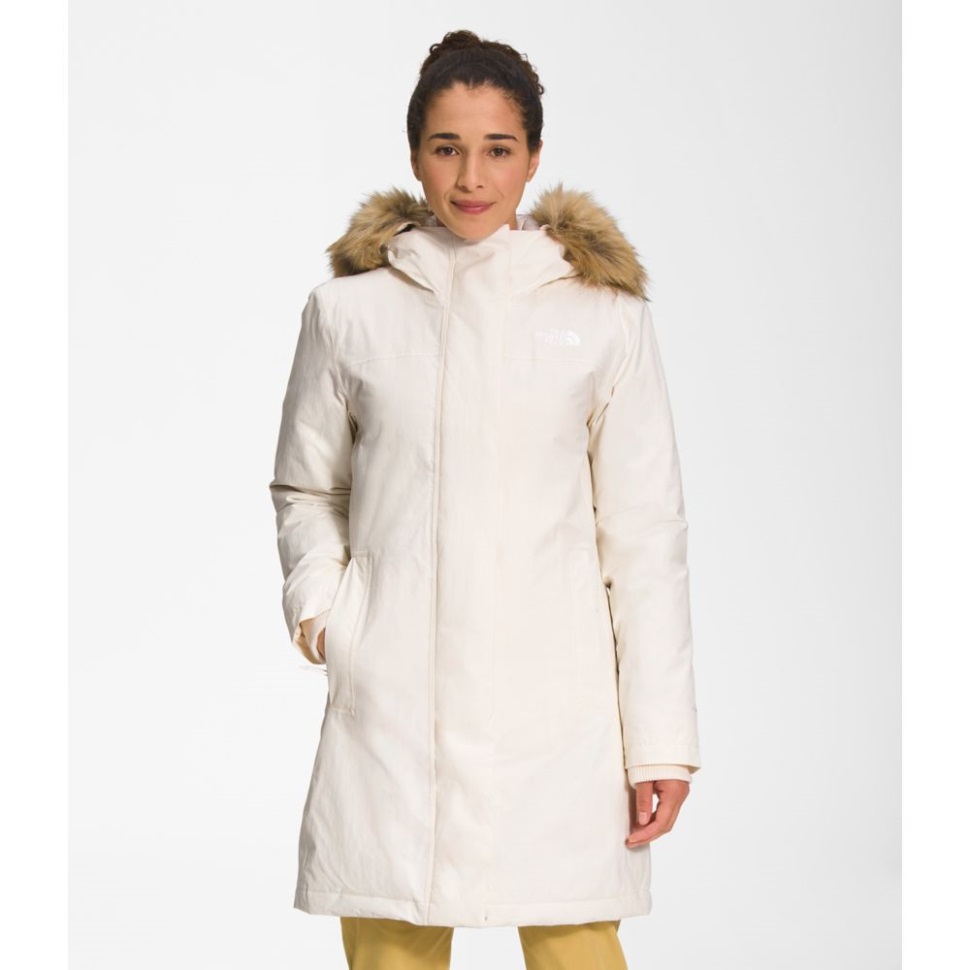 المرأة الشمالية تواجه القطب الشمالي سترة بيضاء